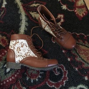 Side laced brown boots