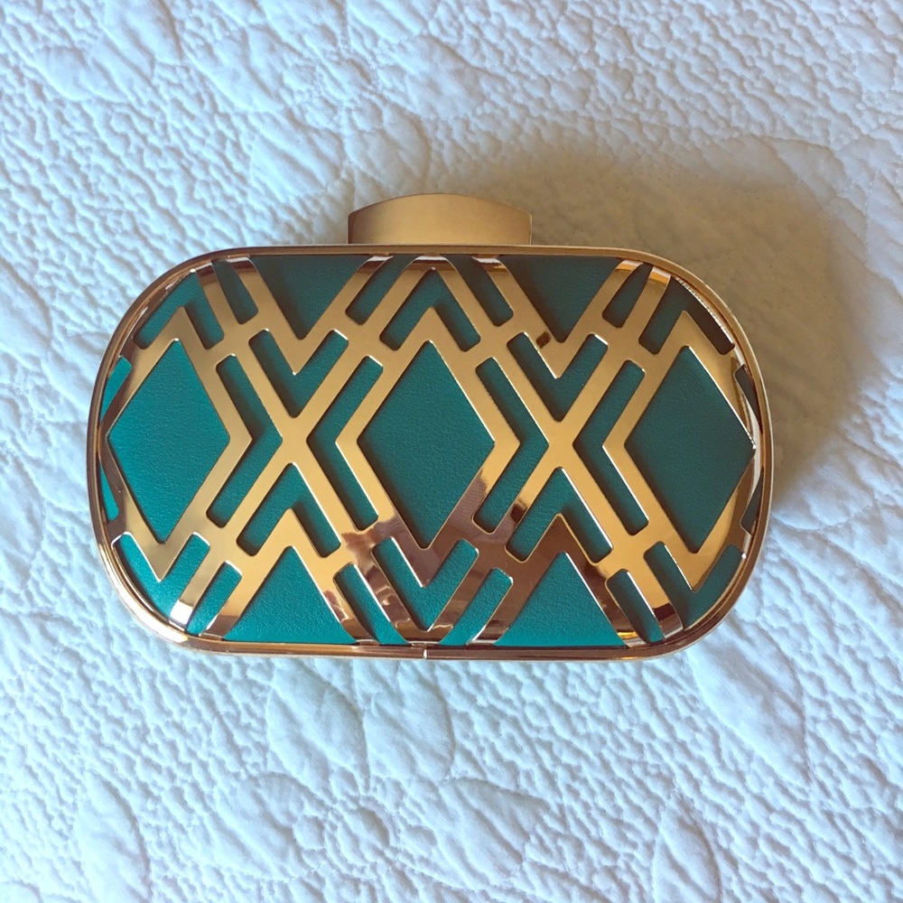 Brand new turquoise clutch with chain