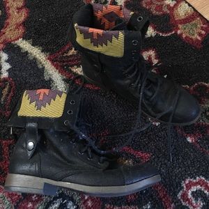 Black boots with colorful detail inside