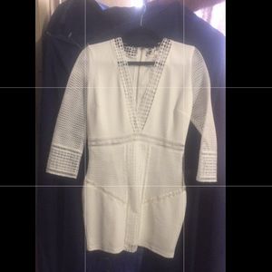 White tight fitting club dress.