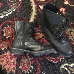 Black zippered combat boots
