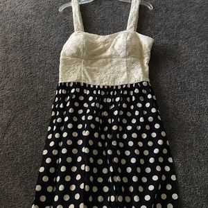 White and navy blue Polk a dot dress for teens
