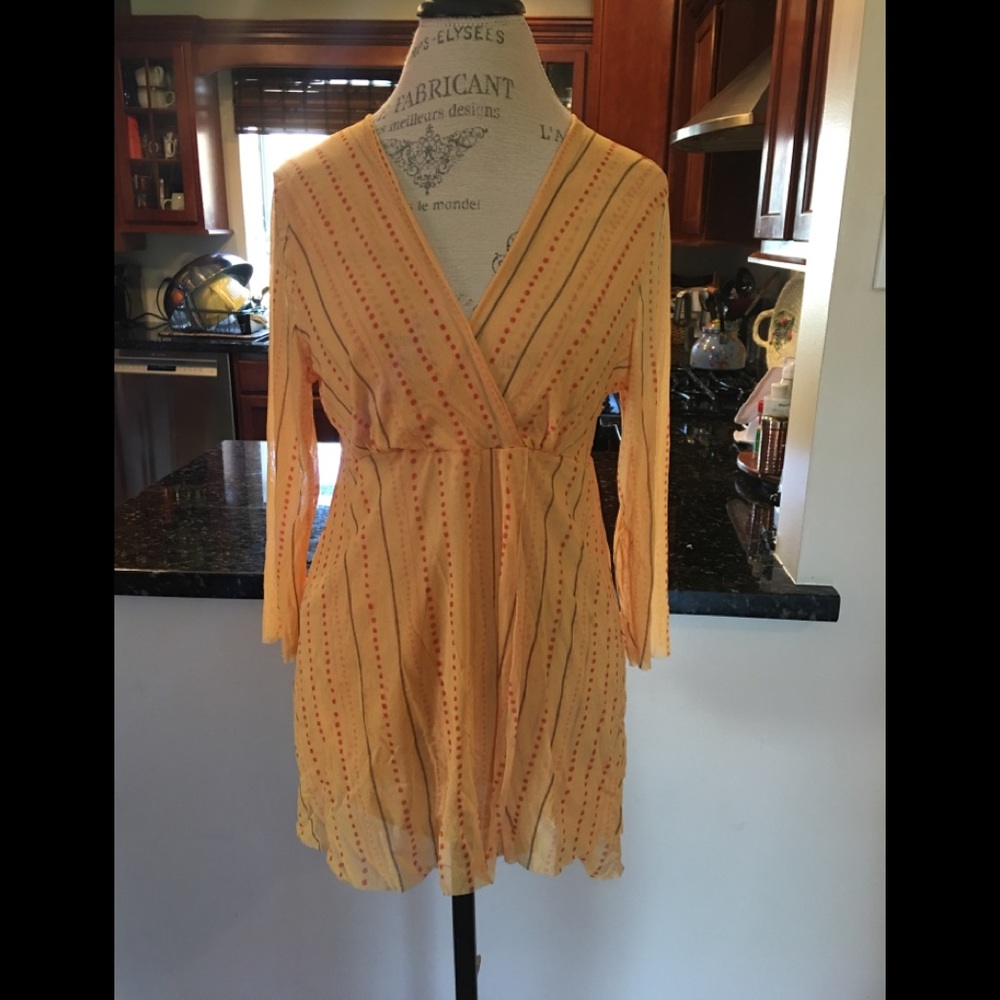 NWT. Sweet Pea Top in Buttery Yellow