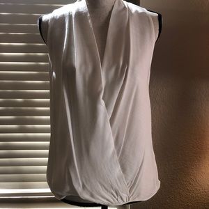 High low sleeveless blouse.