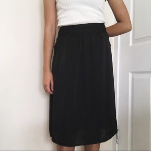 Apostrophe black midi skirt