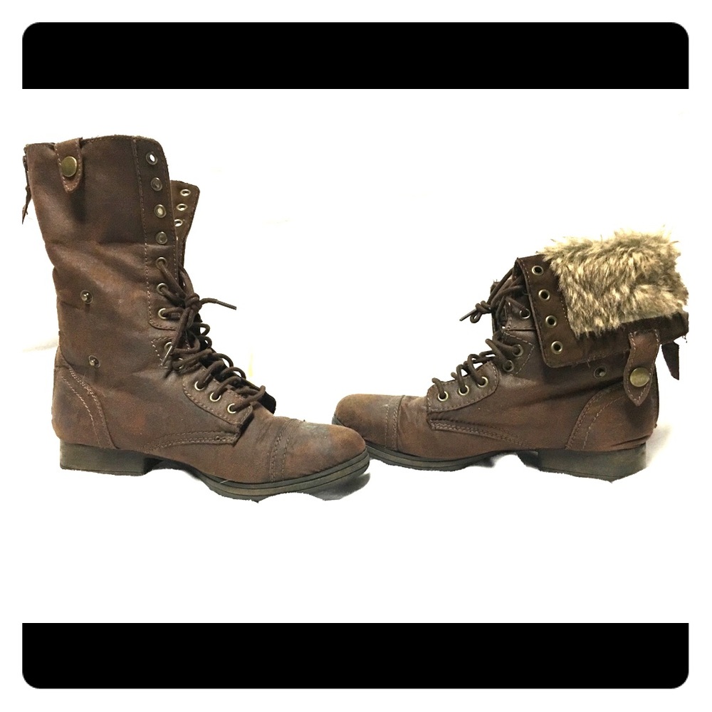 Brown faux leather/suede boots with a bit of fur.