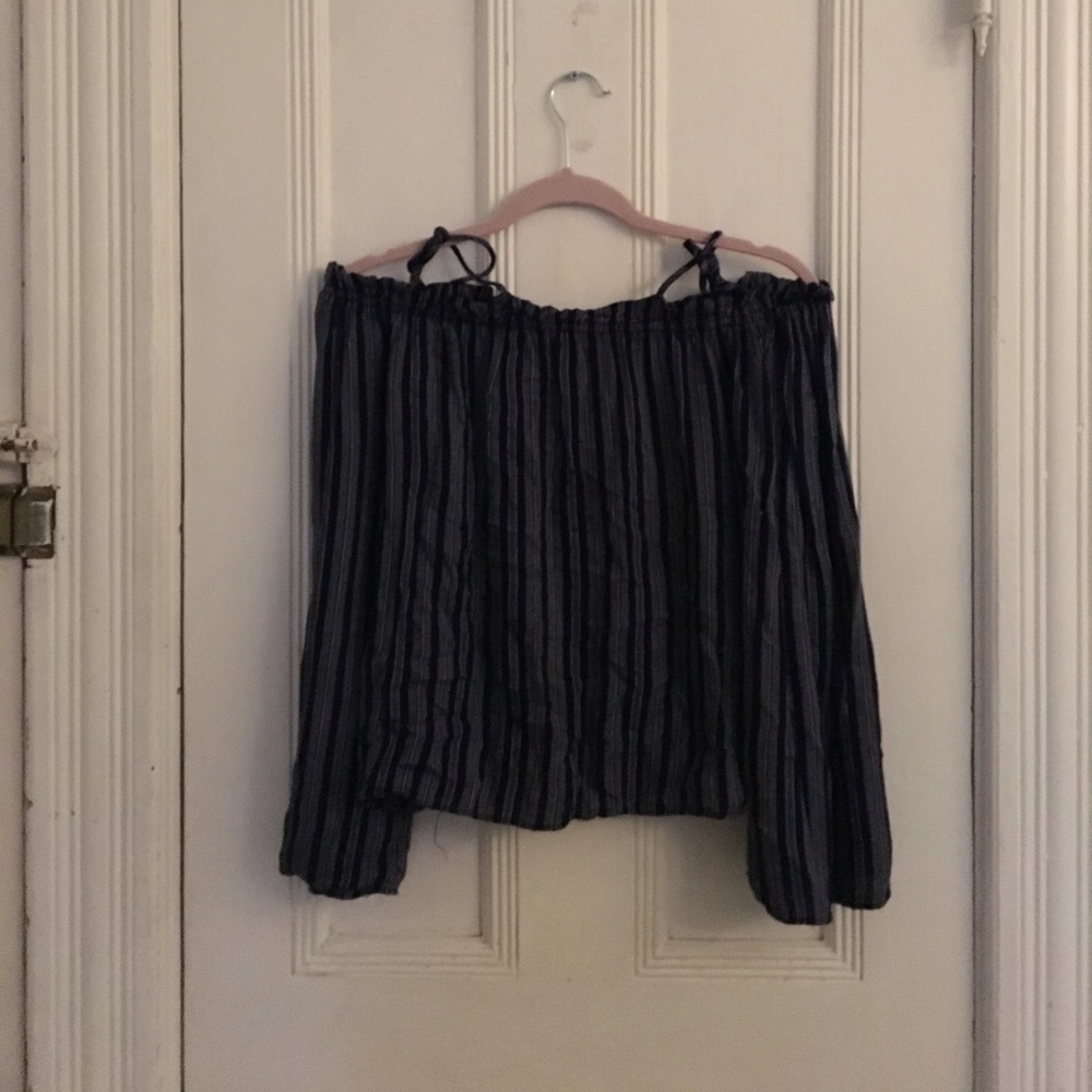 Never been worn off the shoulder shirt