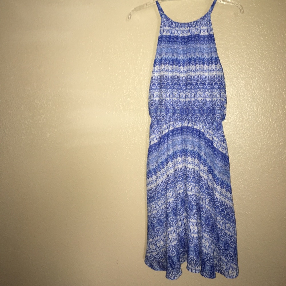 Blue flowy patterned dress.
