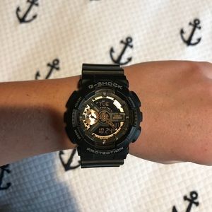 G Shock watch with rose gold accents