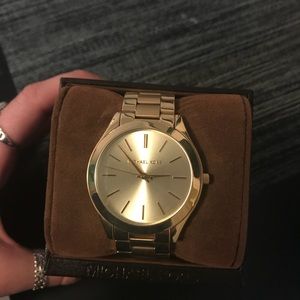 Never worn gold Michael Kors watch