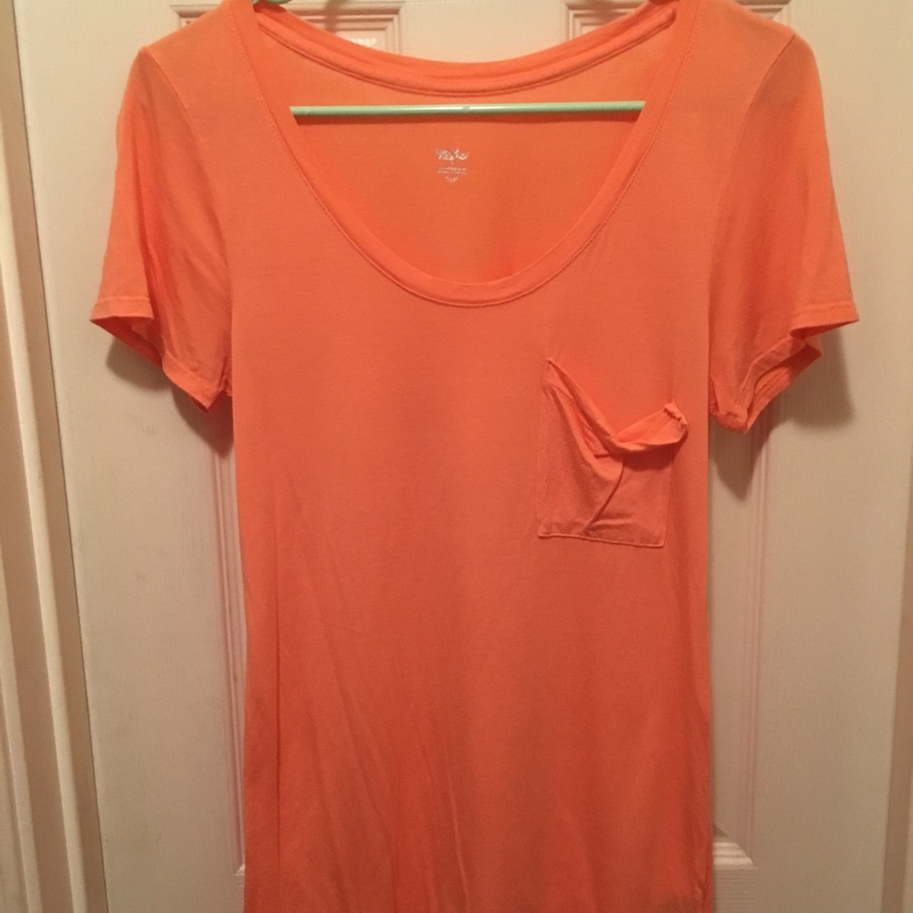 Pink top with front pocket
