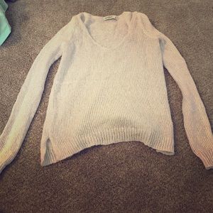 A sweater. Size large but it’s fits a small