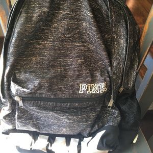 Grey and white Victoria’s Secret backpack