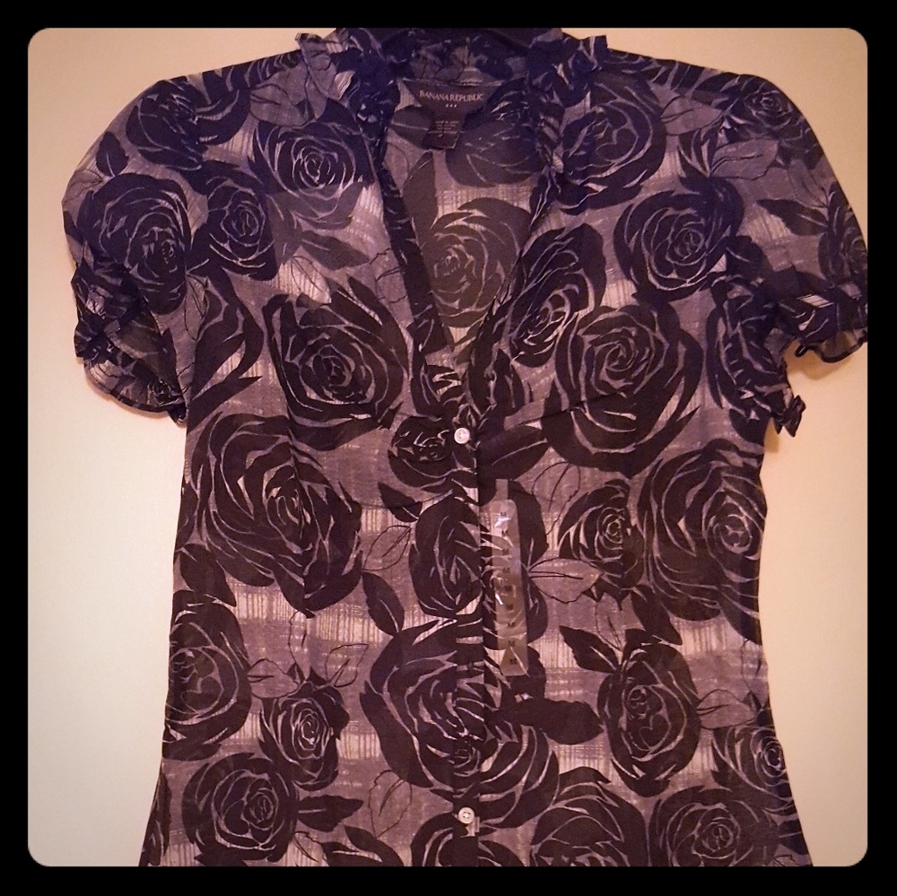 Feminine sheer black blouse with roses