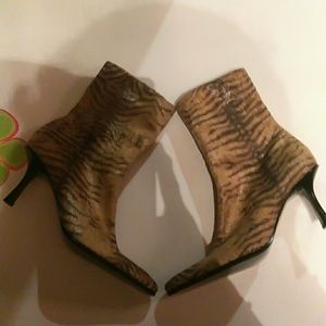 Nine West ankle animal print boots.