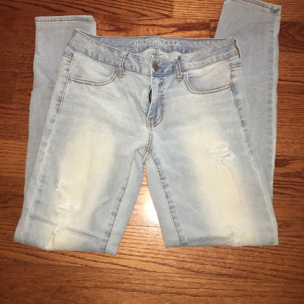 Light wash, machine distressed skinny jeans