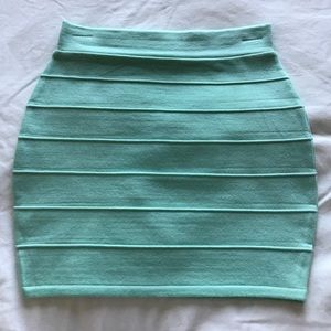 Mint green body con mini skirt