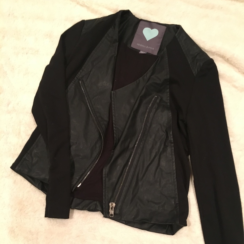 Vegan leather/ material jacket.