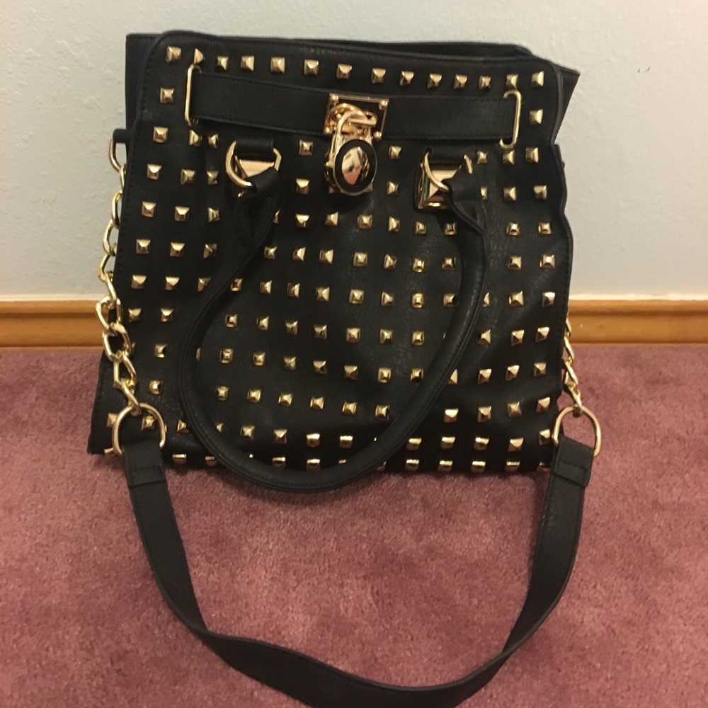 Studded black tote bag