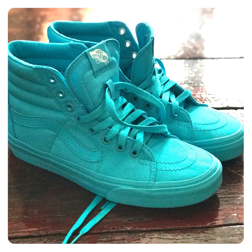 Pair of teal Van Sk8 HI.