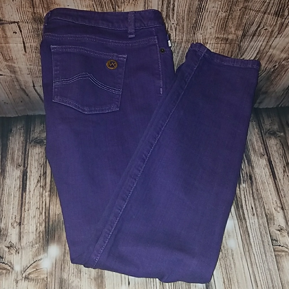 Purple MK skinny leg jeans.