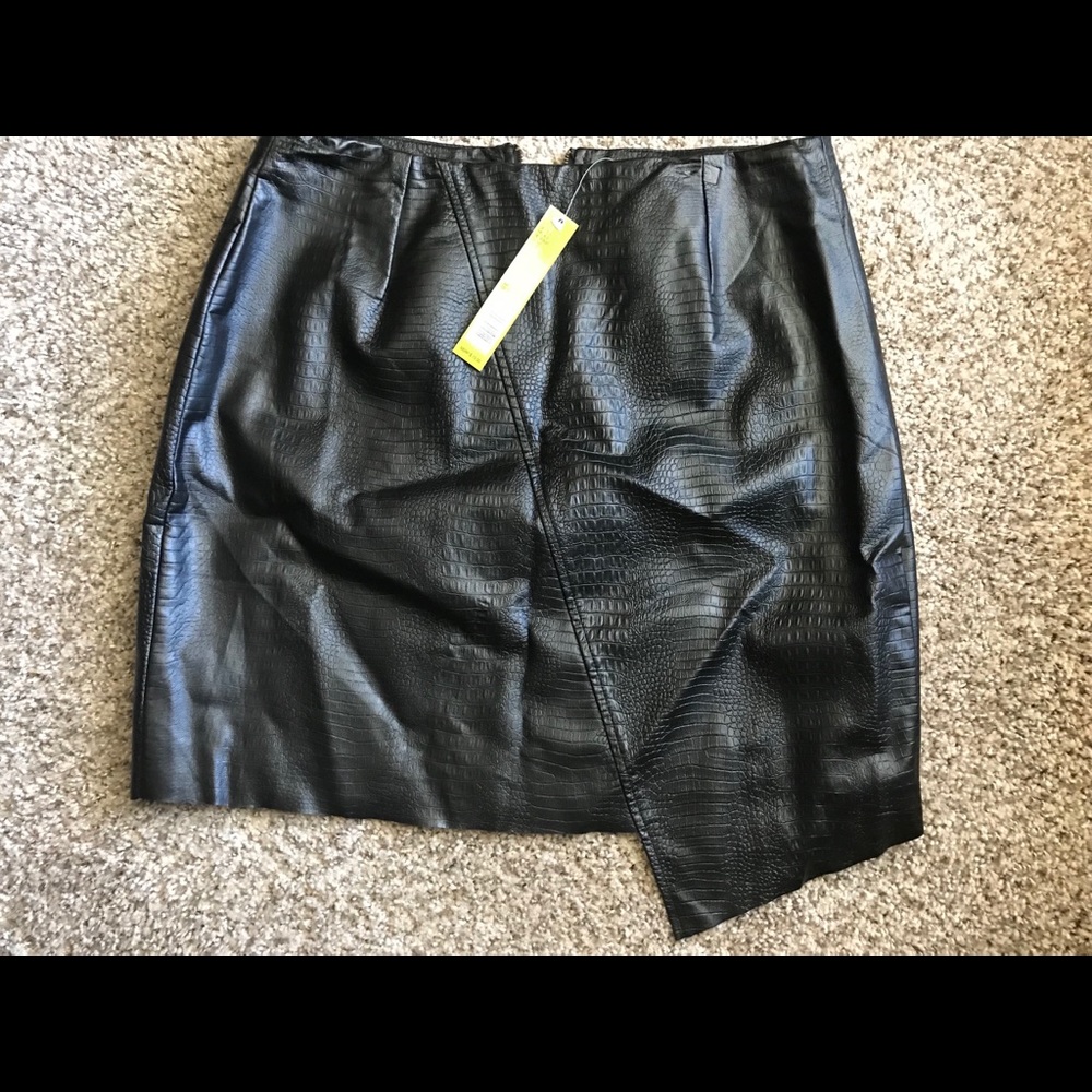 Black asymmetrical faux leather mini skirt