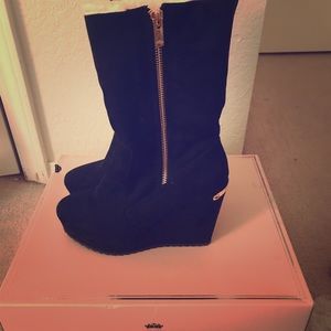 Black zip up wedge boots