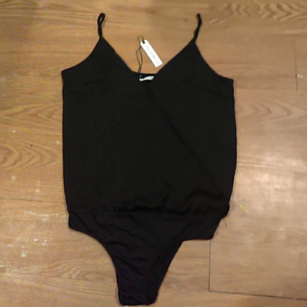 Black tank top with bottom underwear like feature