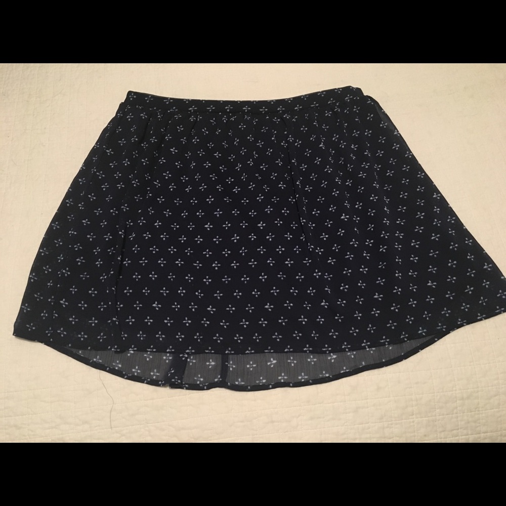 Navy skirt with white print sheer outer layer