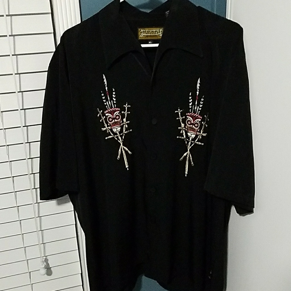 Very cool embroidered black short sleeve.