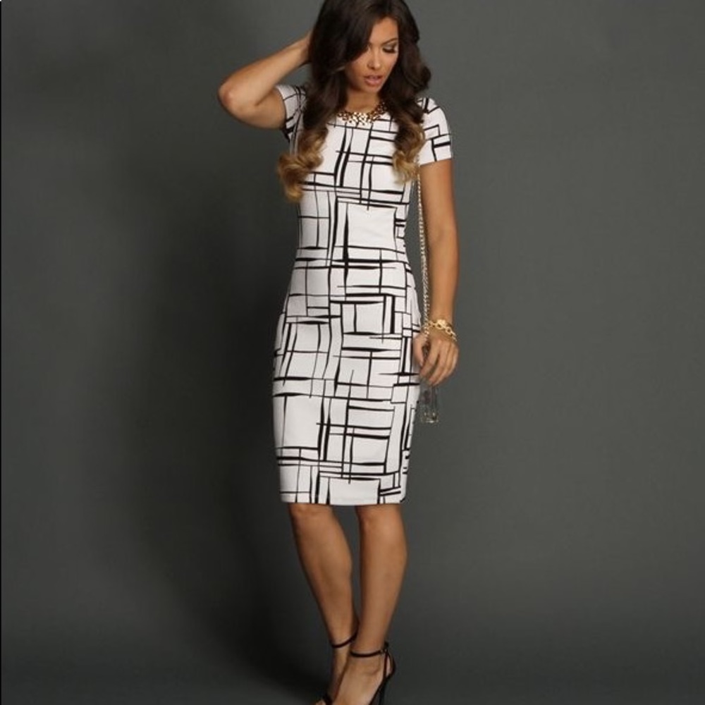 Black and white form fitted midi dress