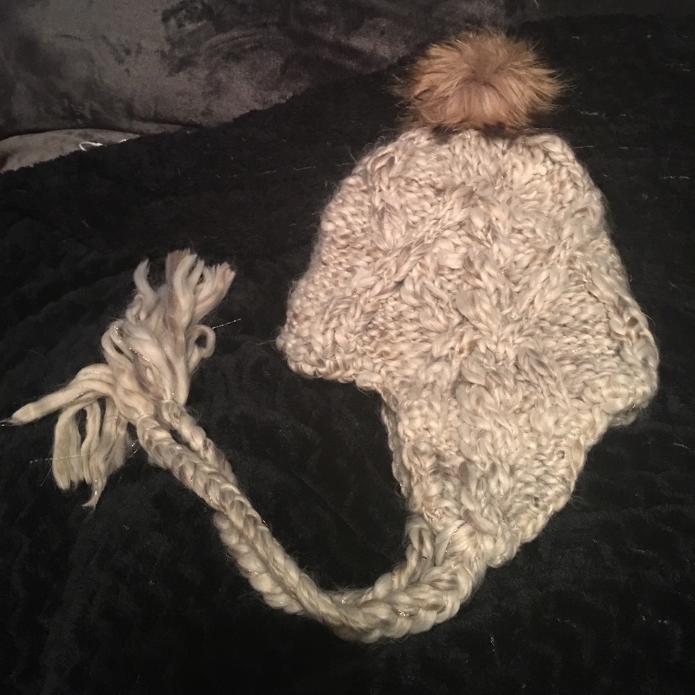 Tan and white Pom Pom hat