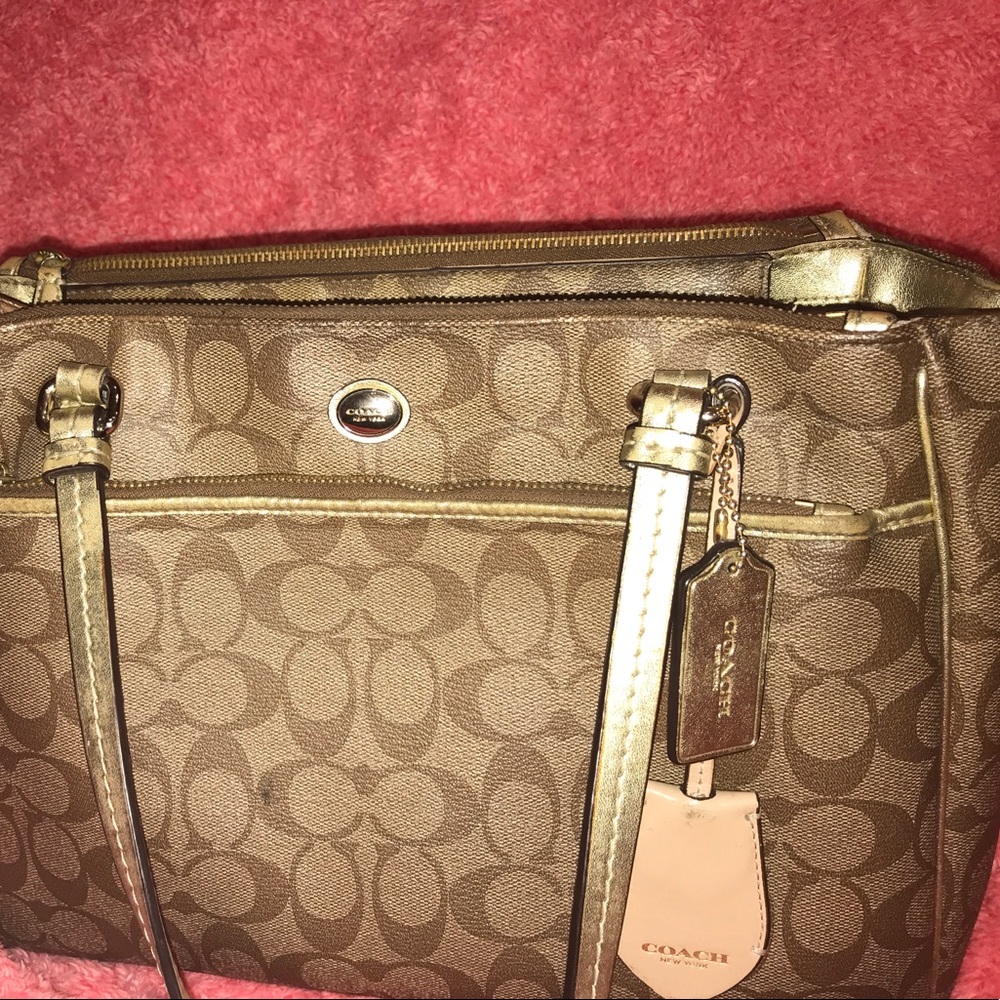 Gold coach purse// SOLD