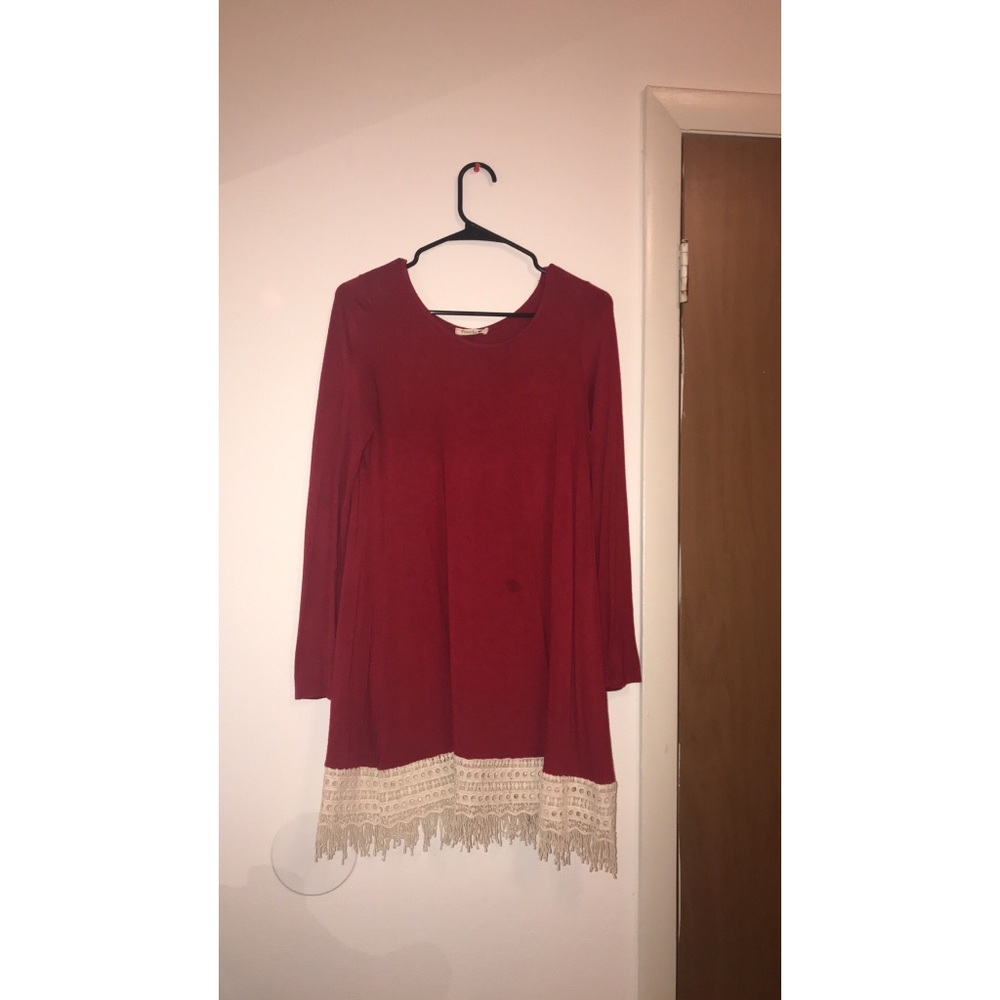 Red boutique dress with white lace at bottom