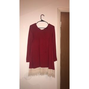 Red boutique dress with white lace at bottom