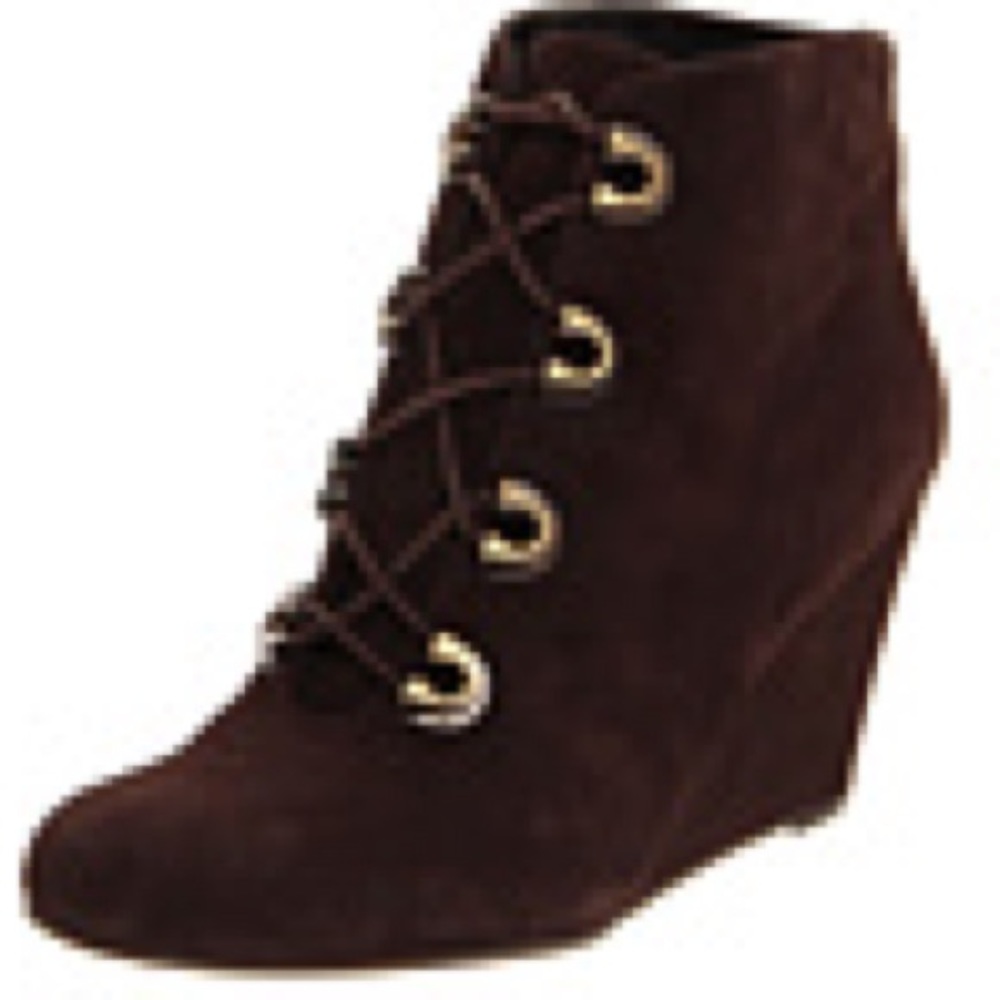 A gently used preloved wedge boot