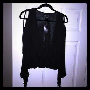 Bebe top Xs black. NWT
