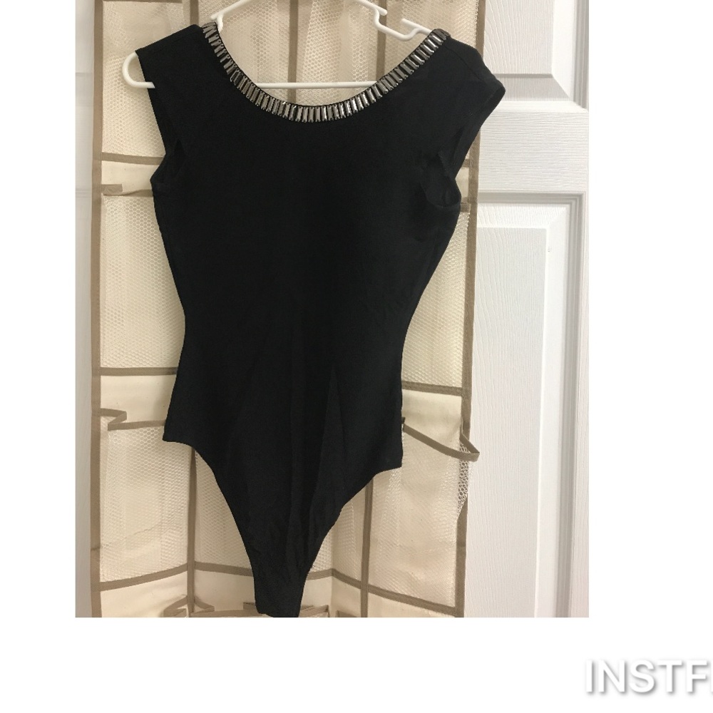 Bebe one piece black lower back