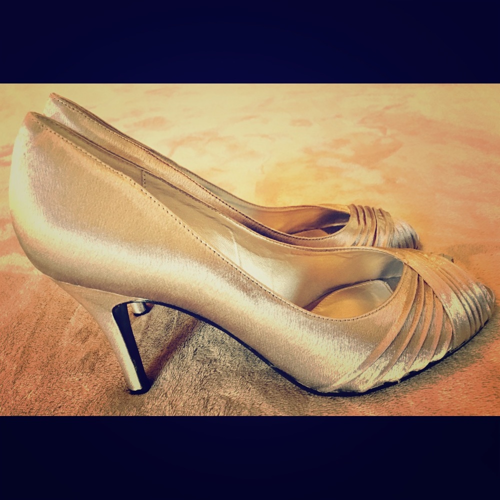 Silver/pewter in color peep toe pumps