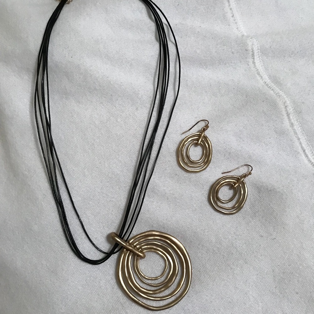 Necklace with matching earrings. Never worn.