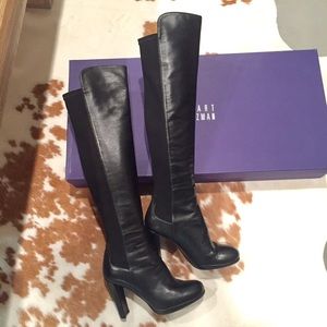 Over the knee high boots. -Stuart Weizman 5050