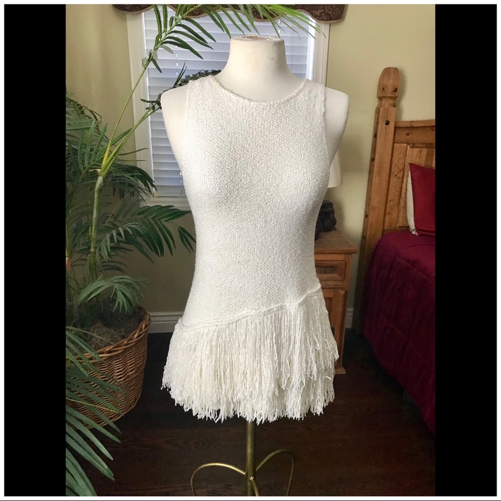 New, unique pseudo-asymmetrical fringe top