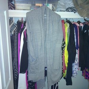 Gray over piece / sweater with pockets