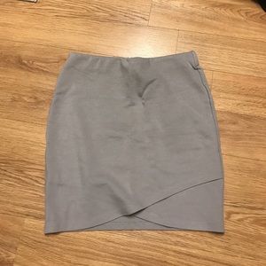 Beige pencil skirt with bottom detailing