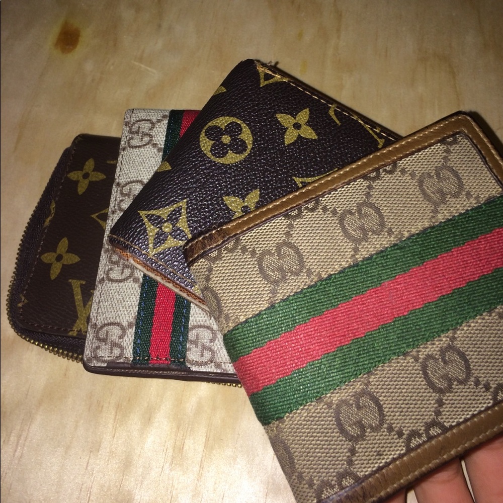 Gucci and Louis Vuitton wallets