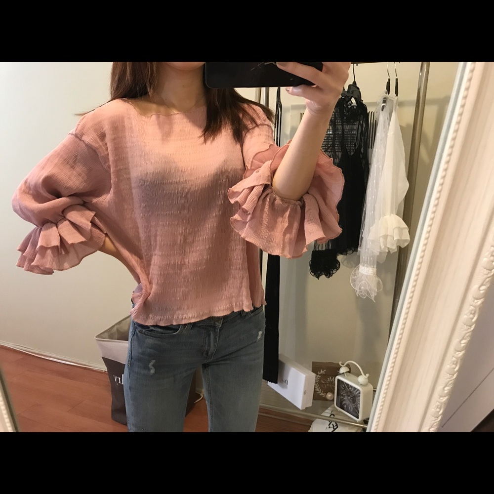 Woven ruffer sleeve crew neck top