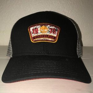 Black and grey Timberland snap back.