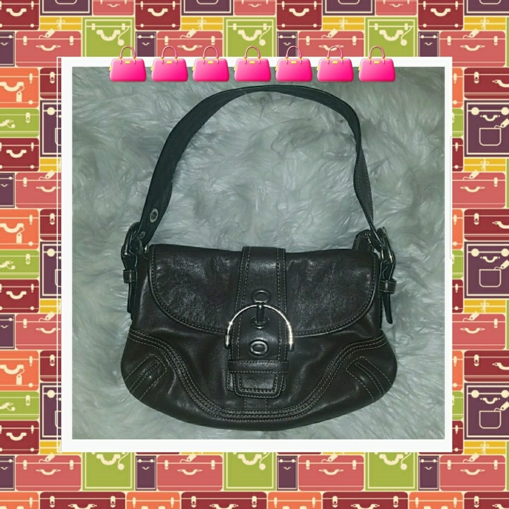 Chocolate Brown Leather Authentic Coach hand bag.