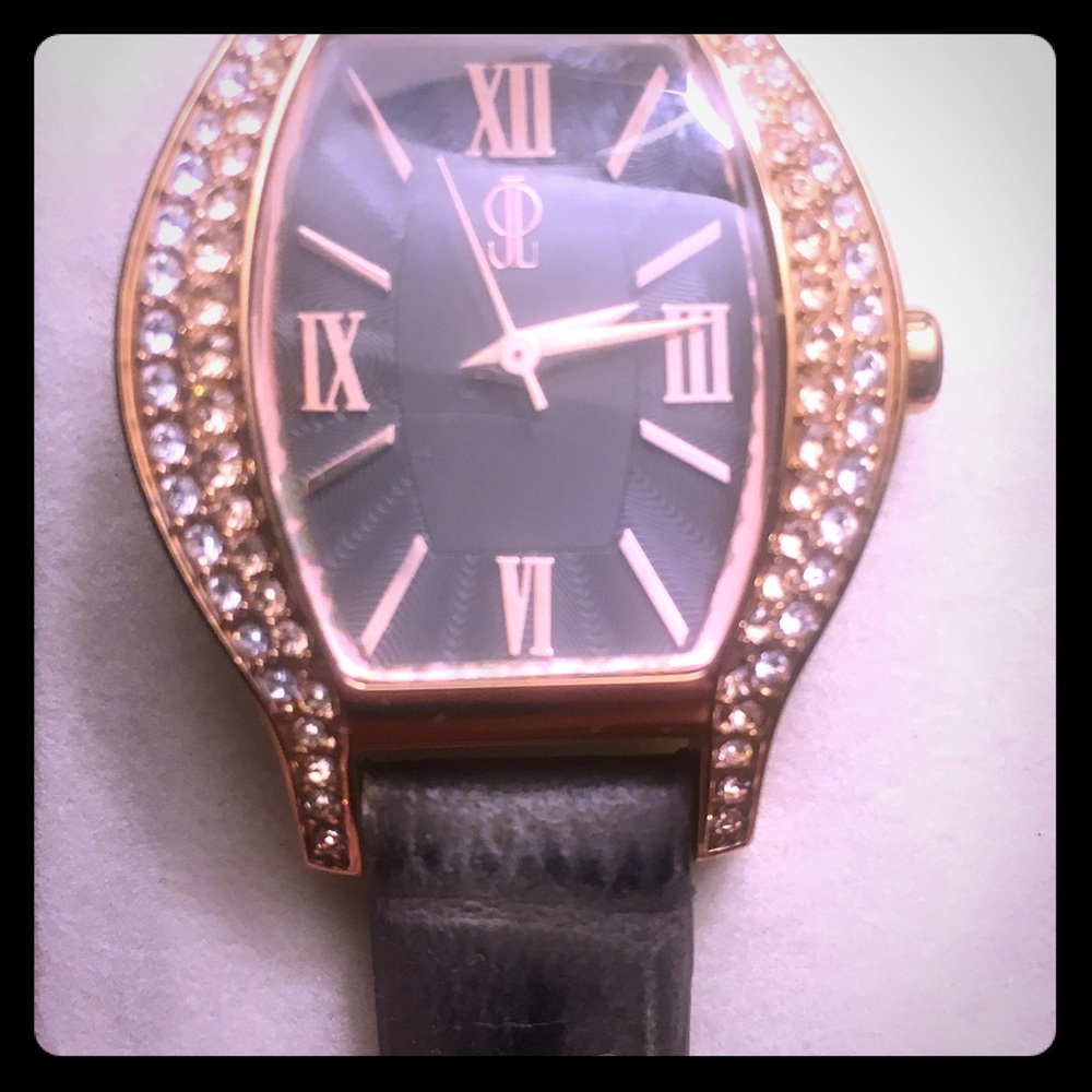 Gold & gems Jennifer Lopez watch