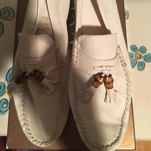 Creme Gucci Men's suede loafers.